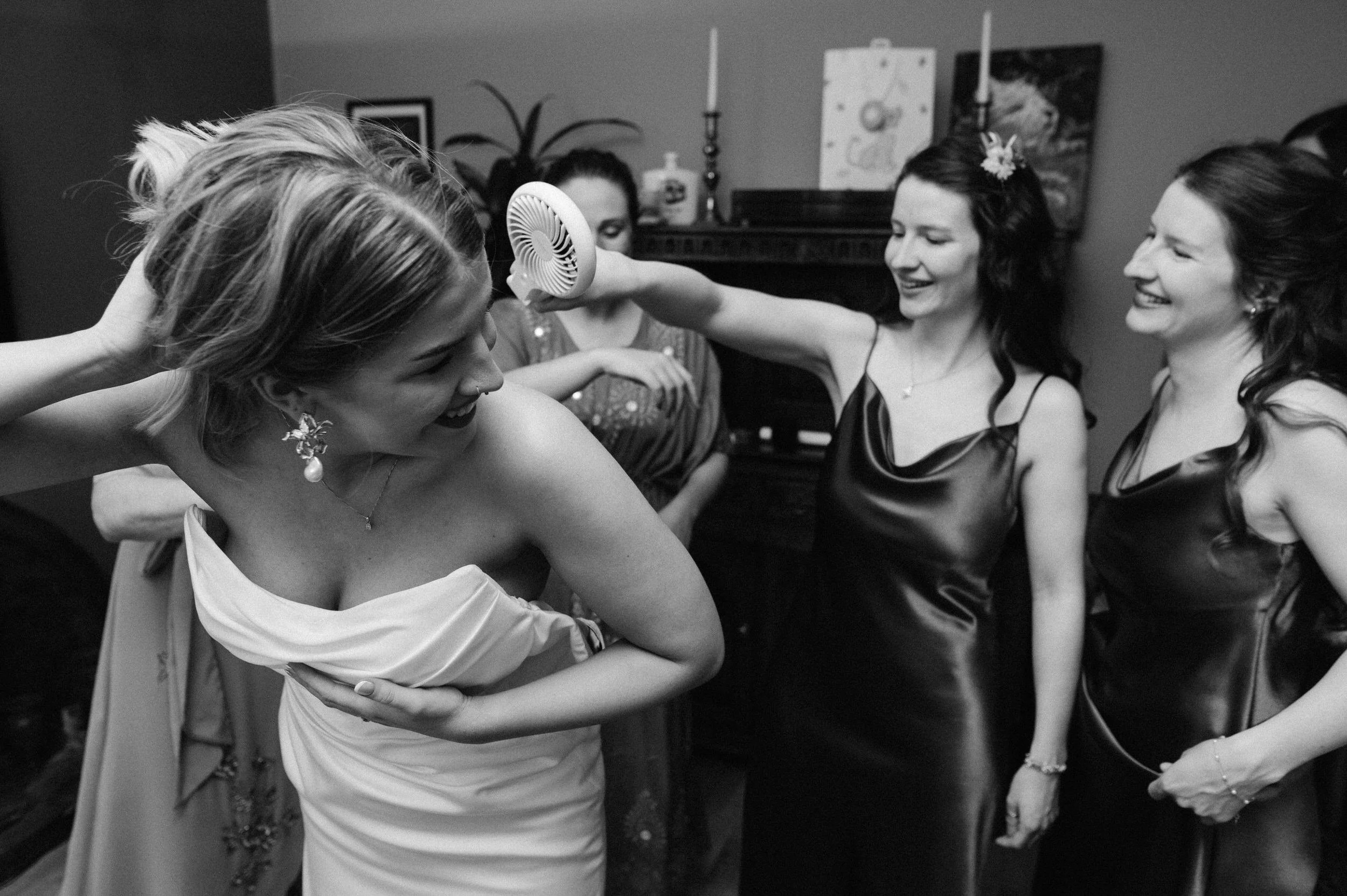 bride and bridesmaids getting ready for this sutton coldfield wedding