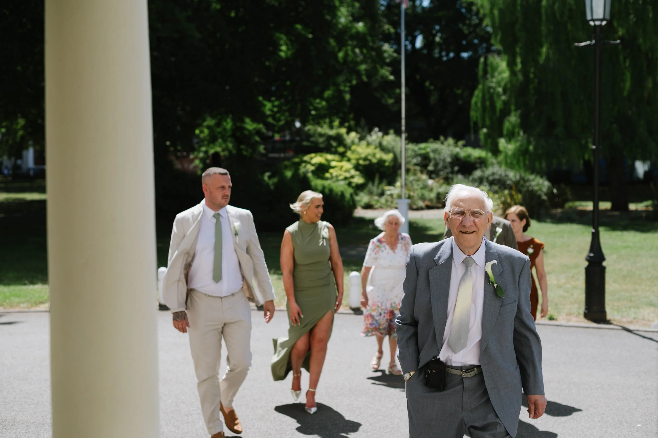 wedding guests arriving at sandwell register office