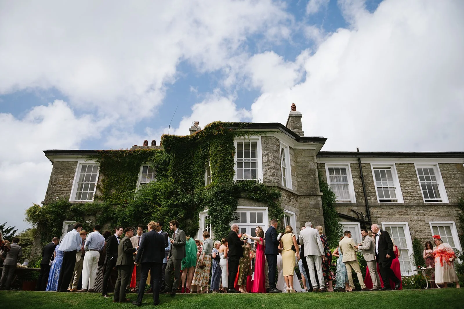 Guests celebrating with cocktails after Halecat House ceremony