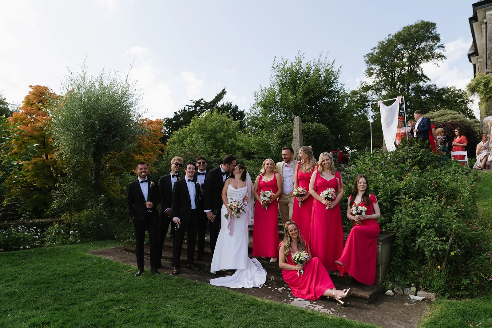 Bridesmaids in pink dresses at Lake District wedding
