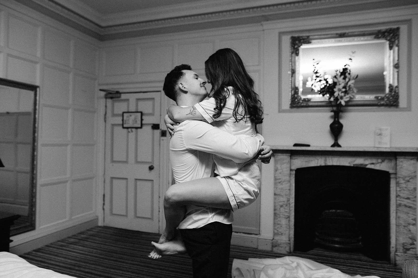 bride and groom in their bedroom at wortley hall