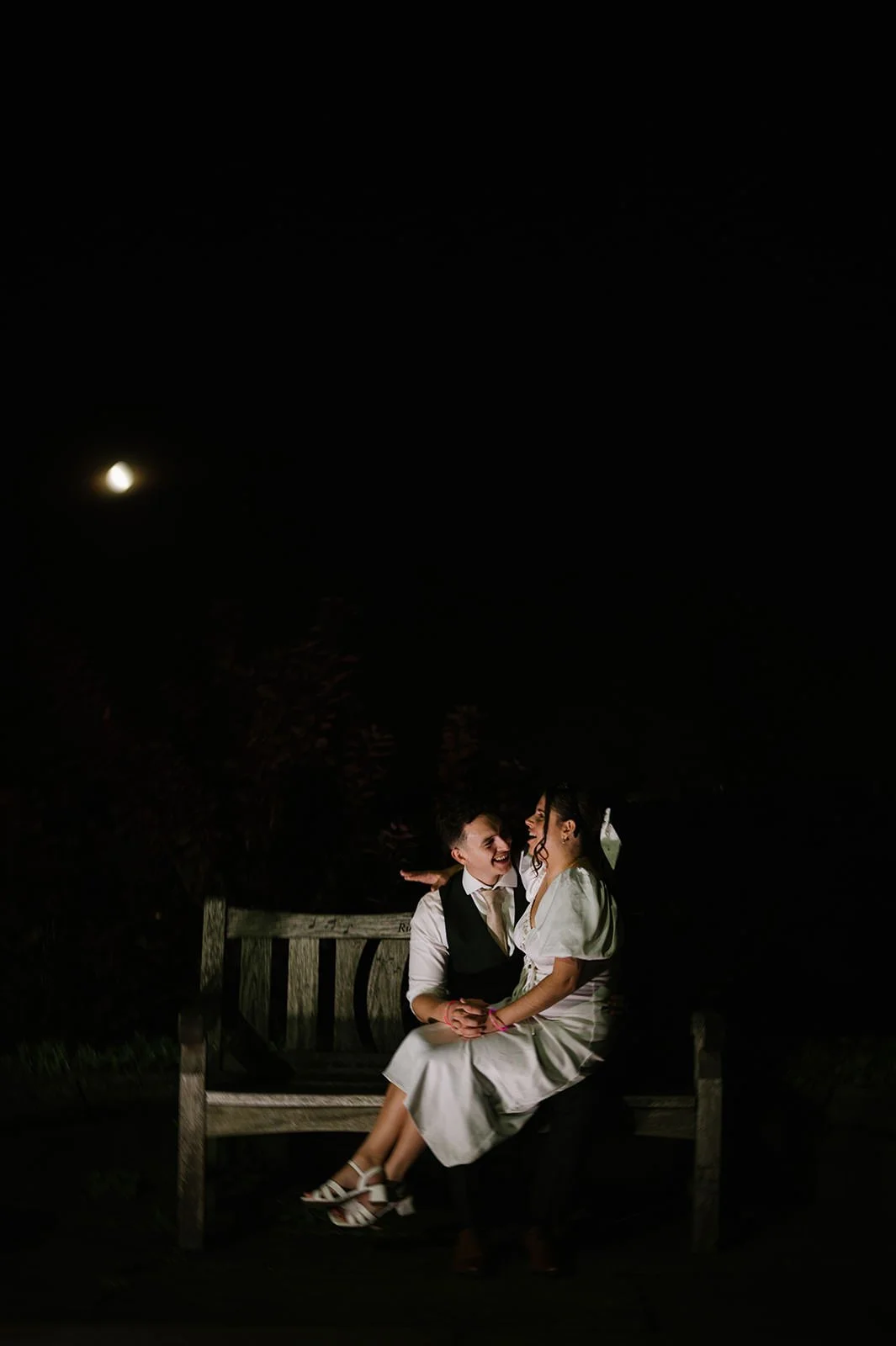Night time wedding portraits under full moon at Wortley Hall