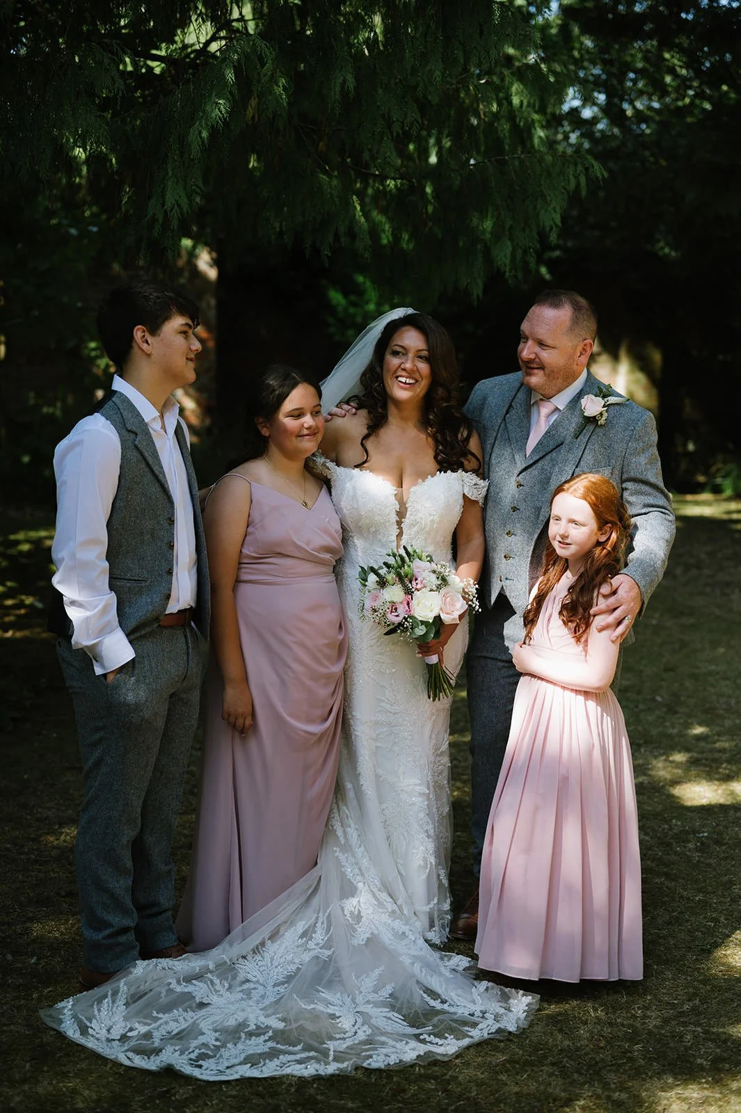 Bride and groom with their children at Old Rectory House