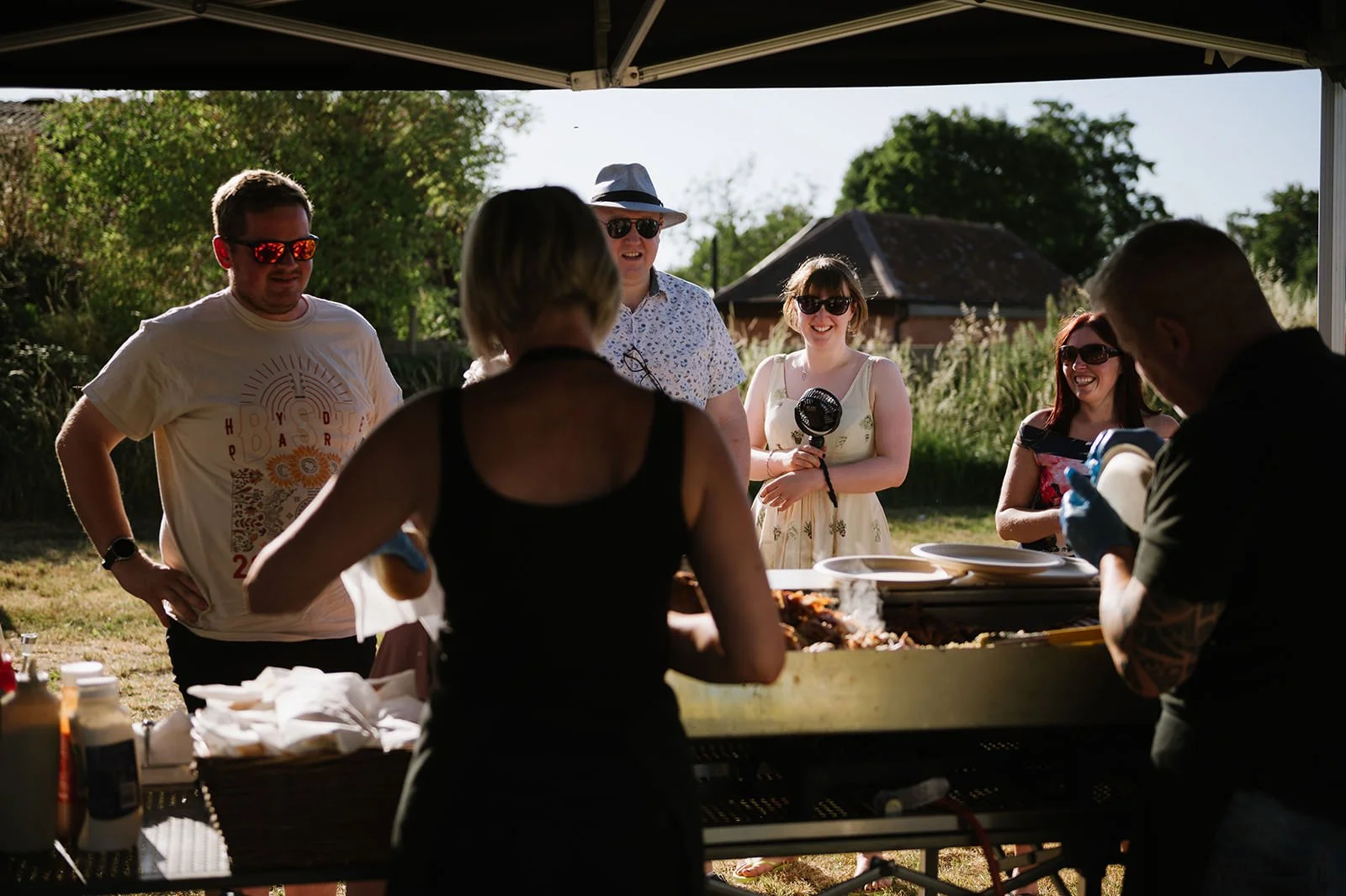 Hog roast buffet at a countryside DIY wedding