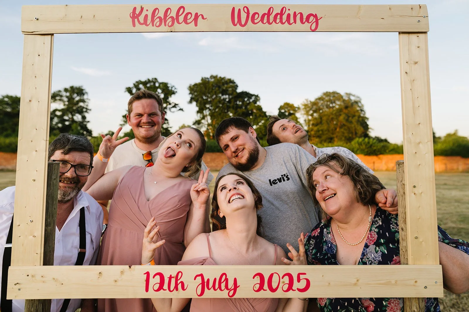 Children playing games at a family-friendly field wedding