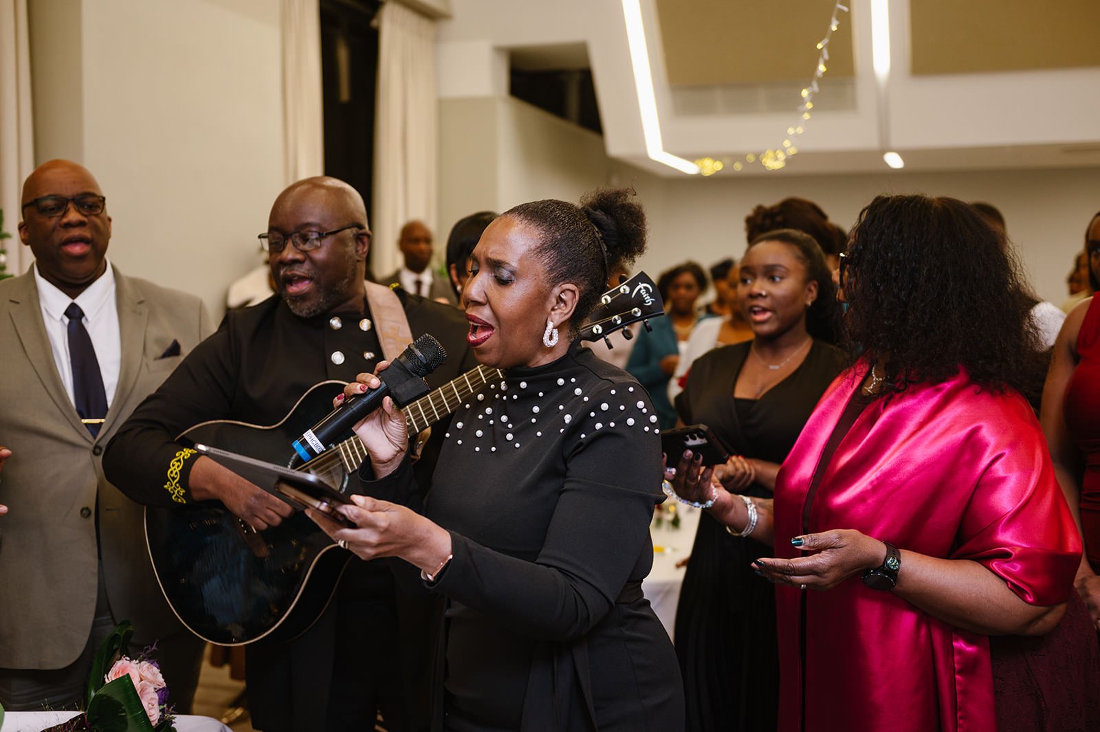 Blessing sung over couple at wedding reception