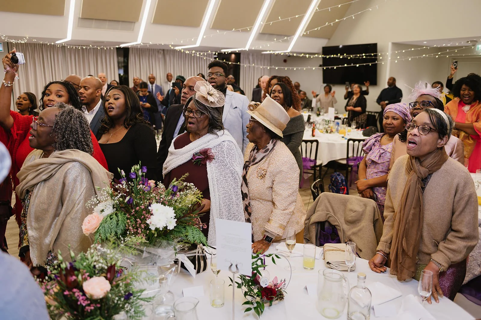 Blessing sung over couple at wedding reception