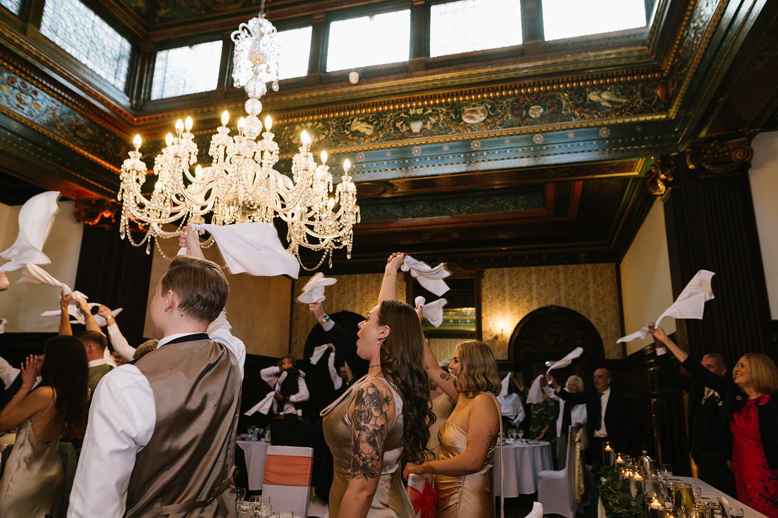 Wedding breakfast in wood panelled room at Wortley Hall