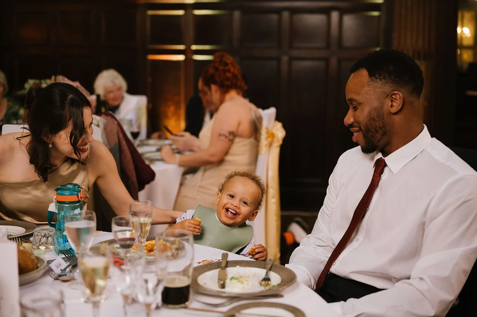 Wedding breakfast in wood panelled room at Wortley Hall