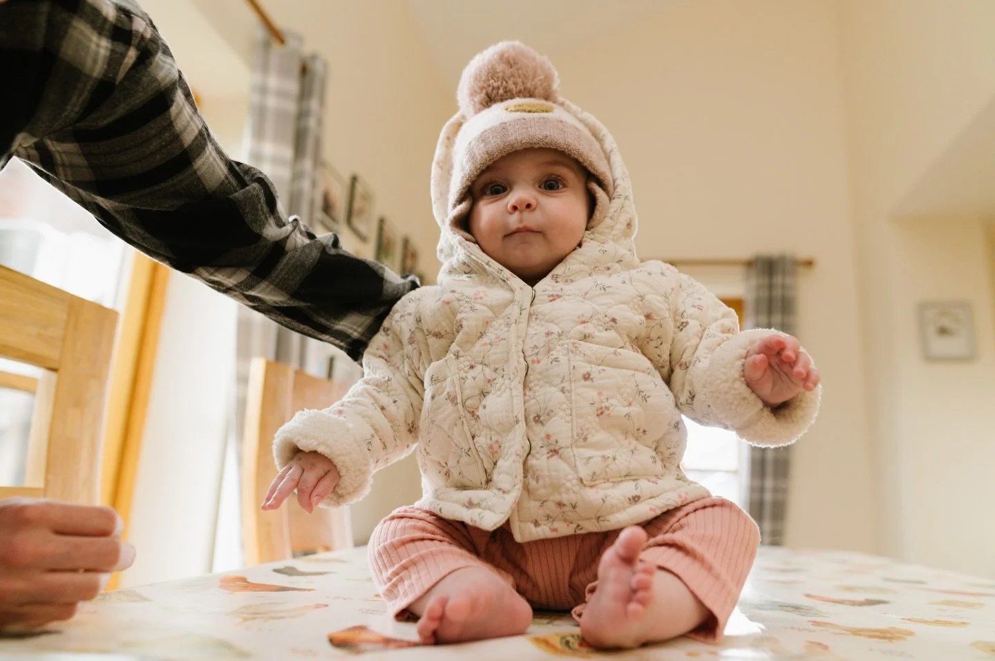 She&rsquo;s changed so much since her first session at six weeks old (she was a real dinky dot). Now she&rsquo;s obsessed with standing, giggles at their dog running around and is in love with a pink pastry brush. 

Cannot wait to see her at session 