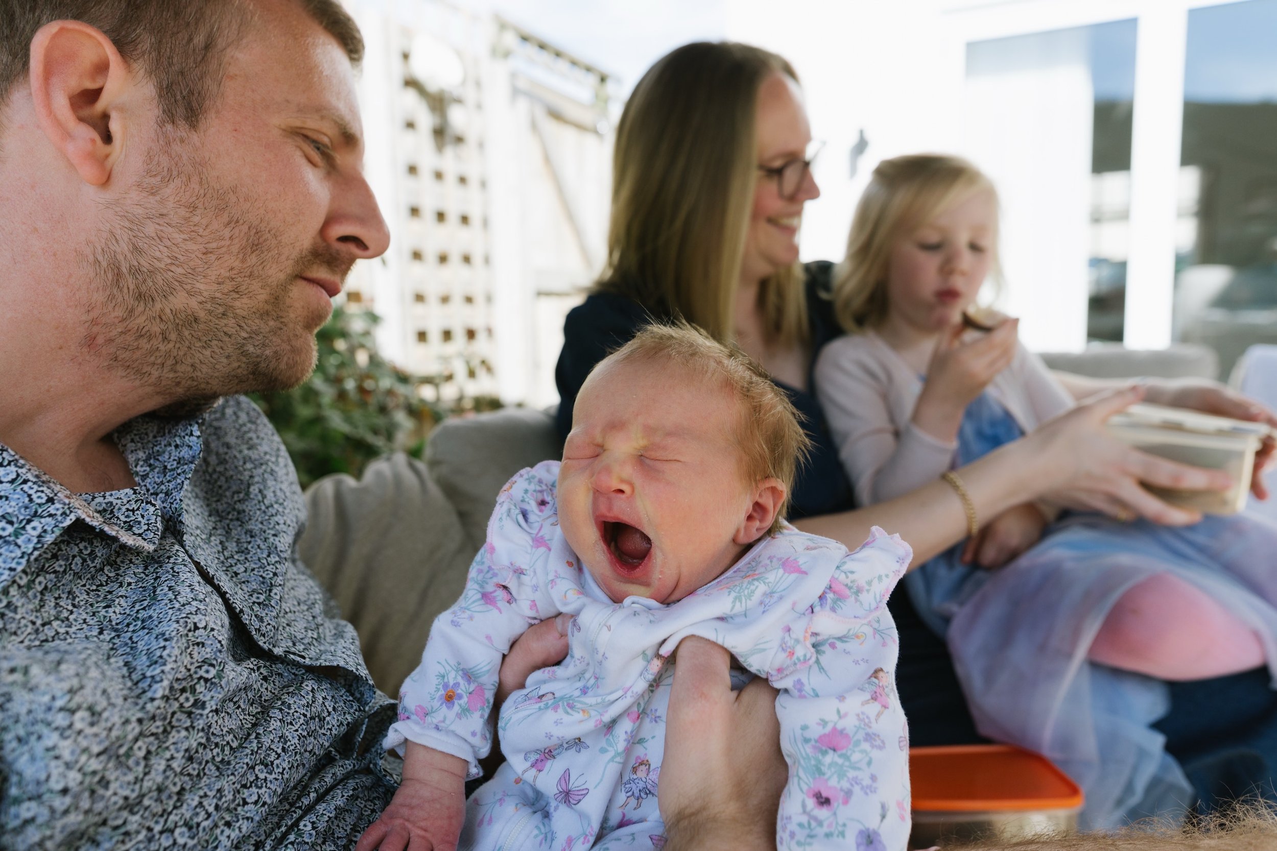 Always being snuggled. Baby Emma and wonderful family are on our blog today. The perfect springtime Saturday for an at home family session. Bio/ stories for the link to more. Muddy knees are family photo perfection!