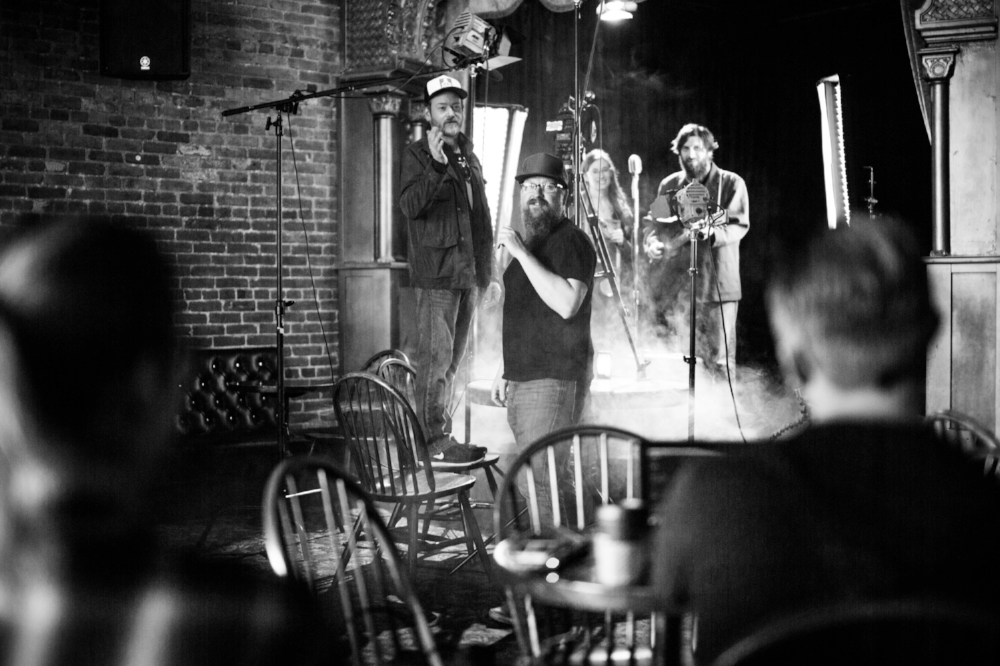 Christian (center - dark hat) directing a music video for the band Hillfolk Noir.