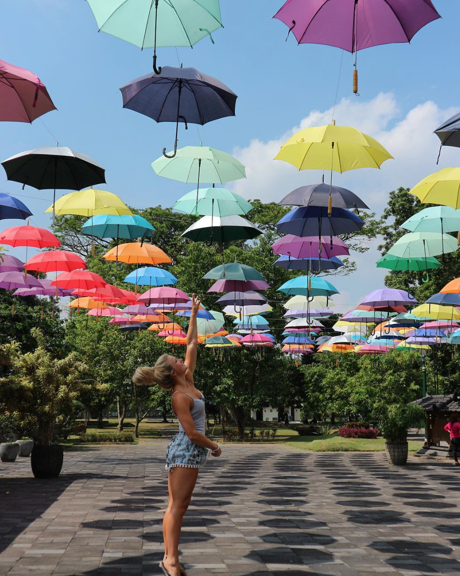 Reaching for the stars (umbrella). Prambanan Temple