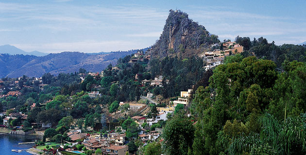 Mirador La Peña Mountain Surrounded by Houses
