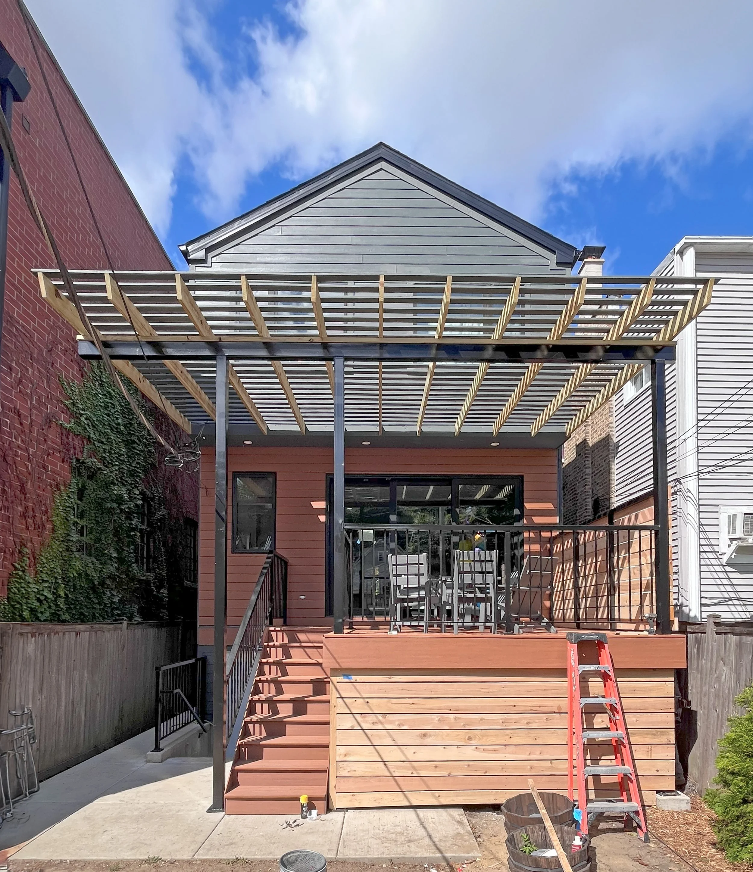 The project under construction, showing the trellis and deck