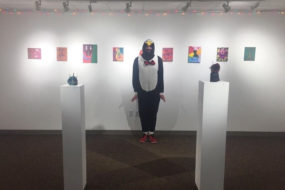  Penguin Josh at his solo art show 