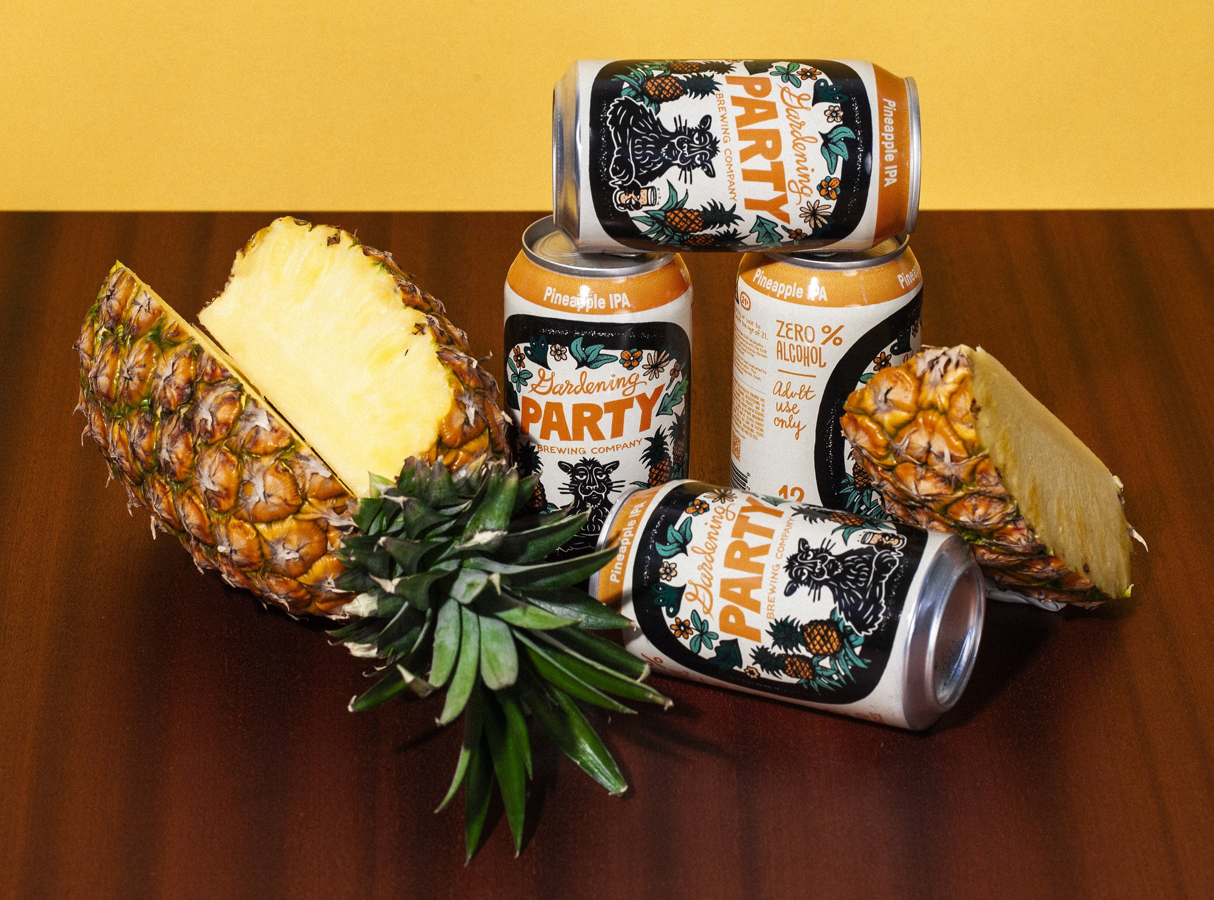 tony_bartolucci_design_gardening_party_pineapple_cans_panther.jpg