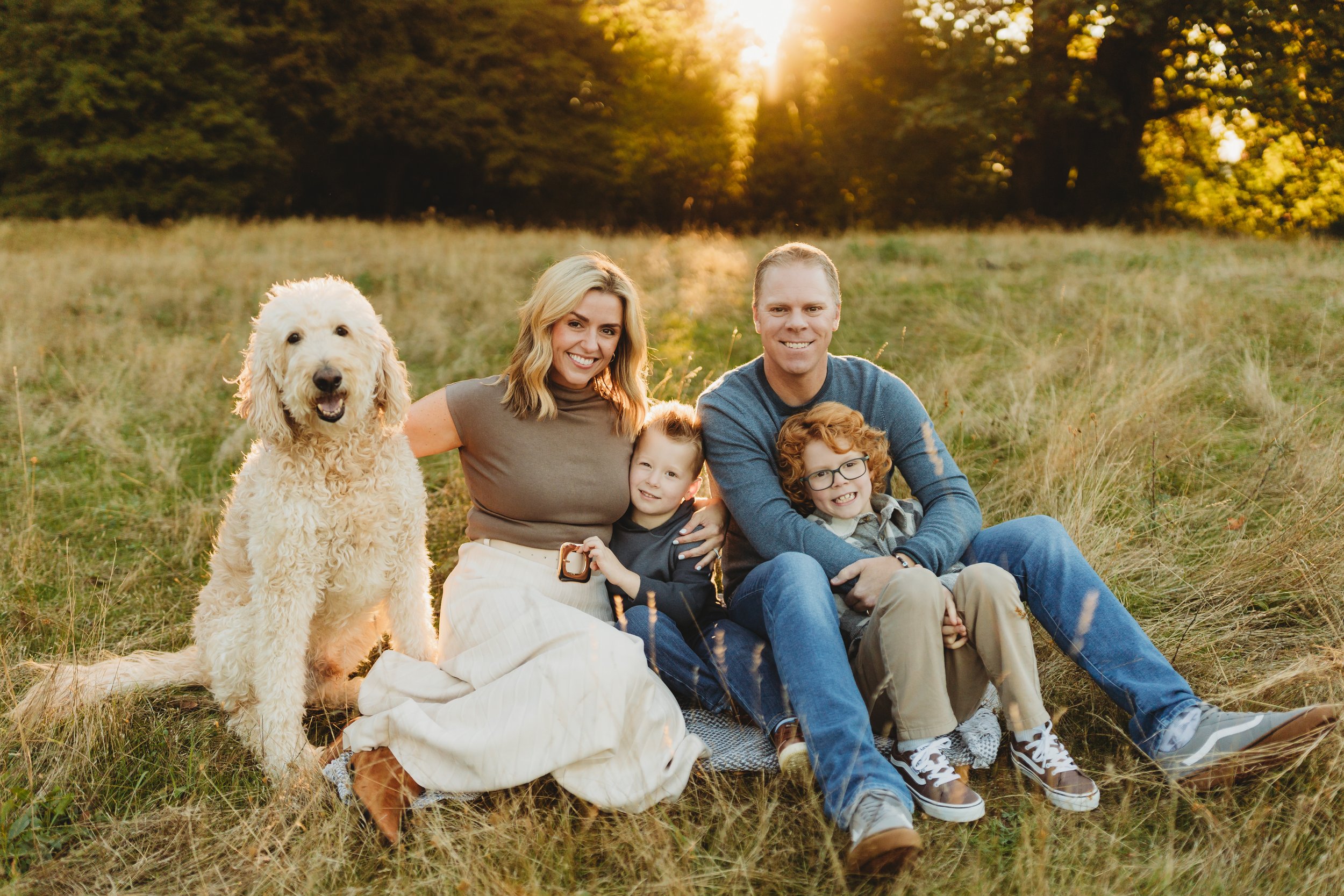 Juanita Bay Park is a beautiful option for Seattle family photos, especially for families bringing their dog. The open grassy fields, quiet paths, and evening light make it ideal for playful, natural moments without feeling crowded or rushed.