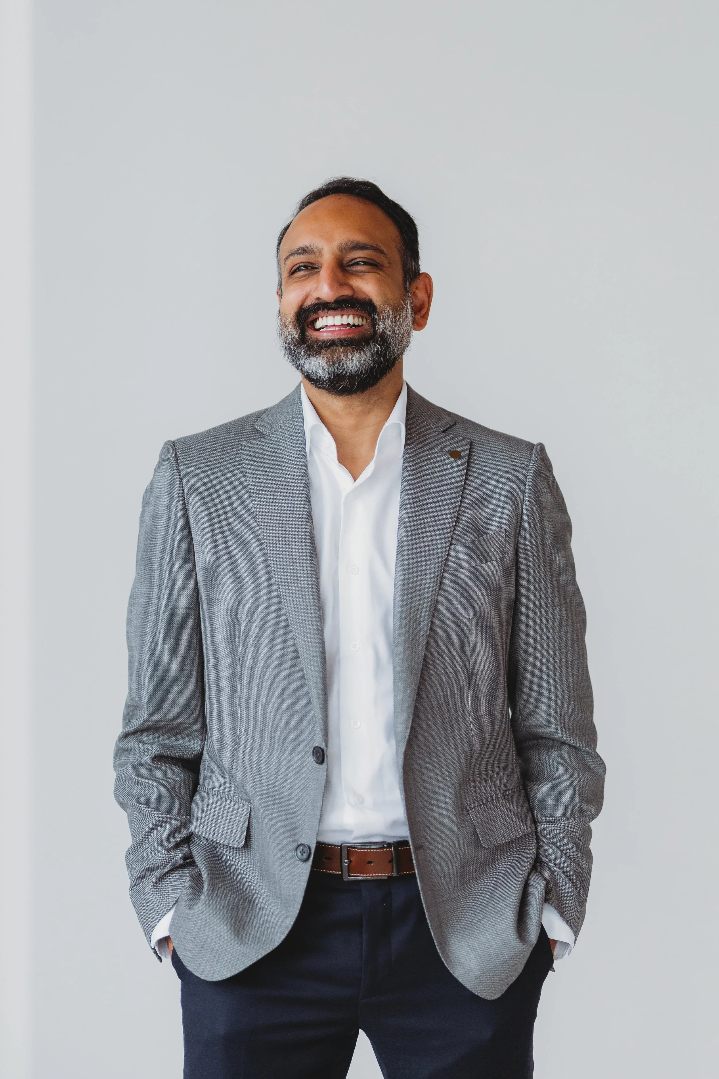 Studio LinkedIn headshot of a man photographed in Seattle against a clean white background.