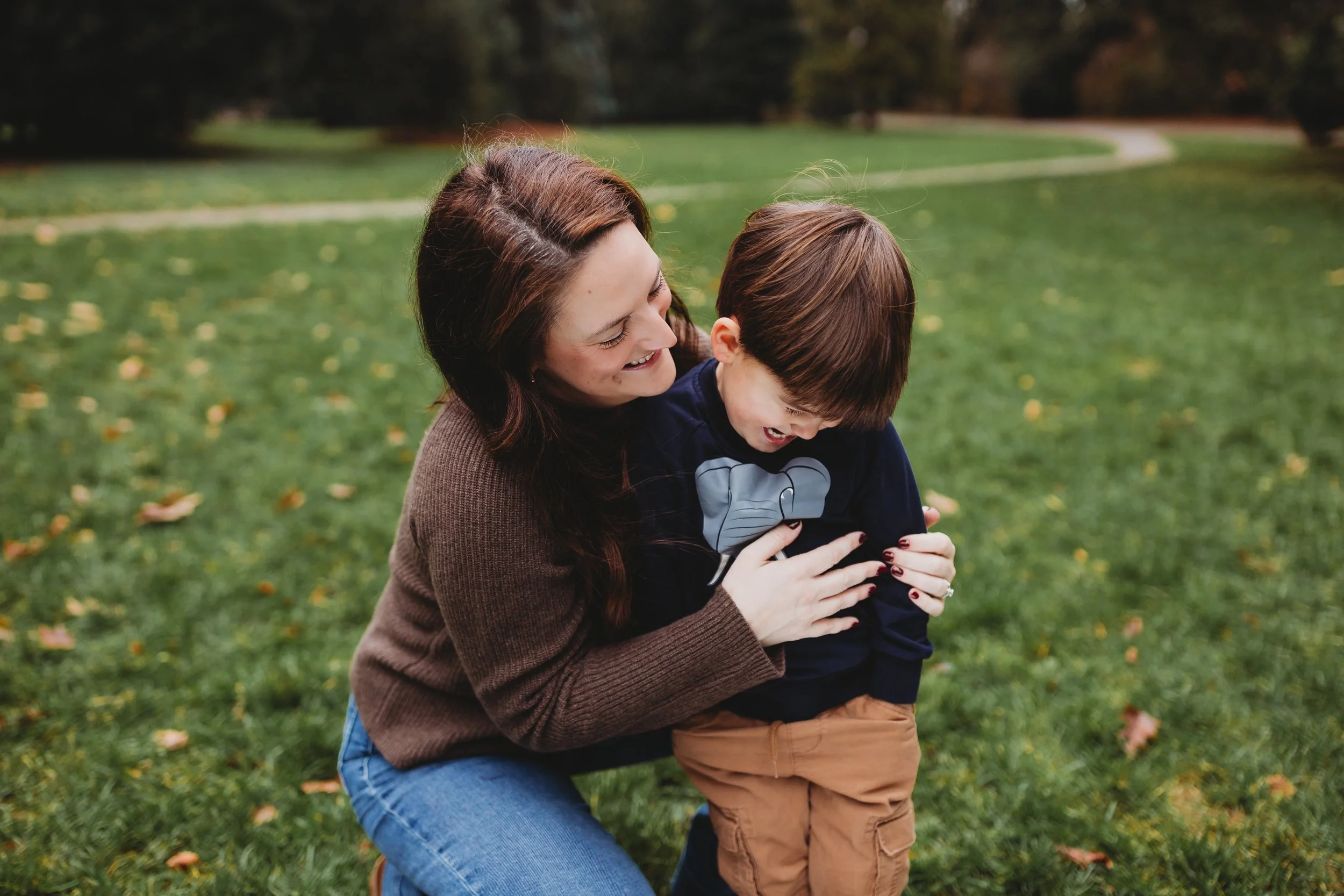 Parent and child sharing a quiet moment during a thoughtfully planned family photo session