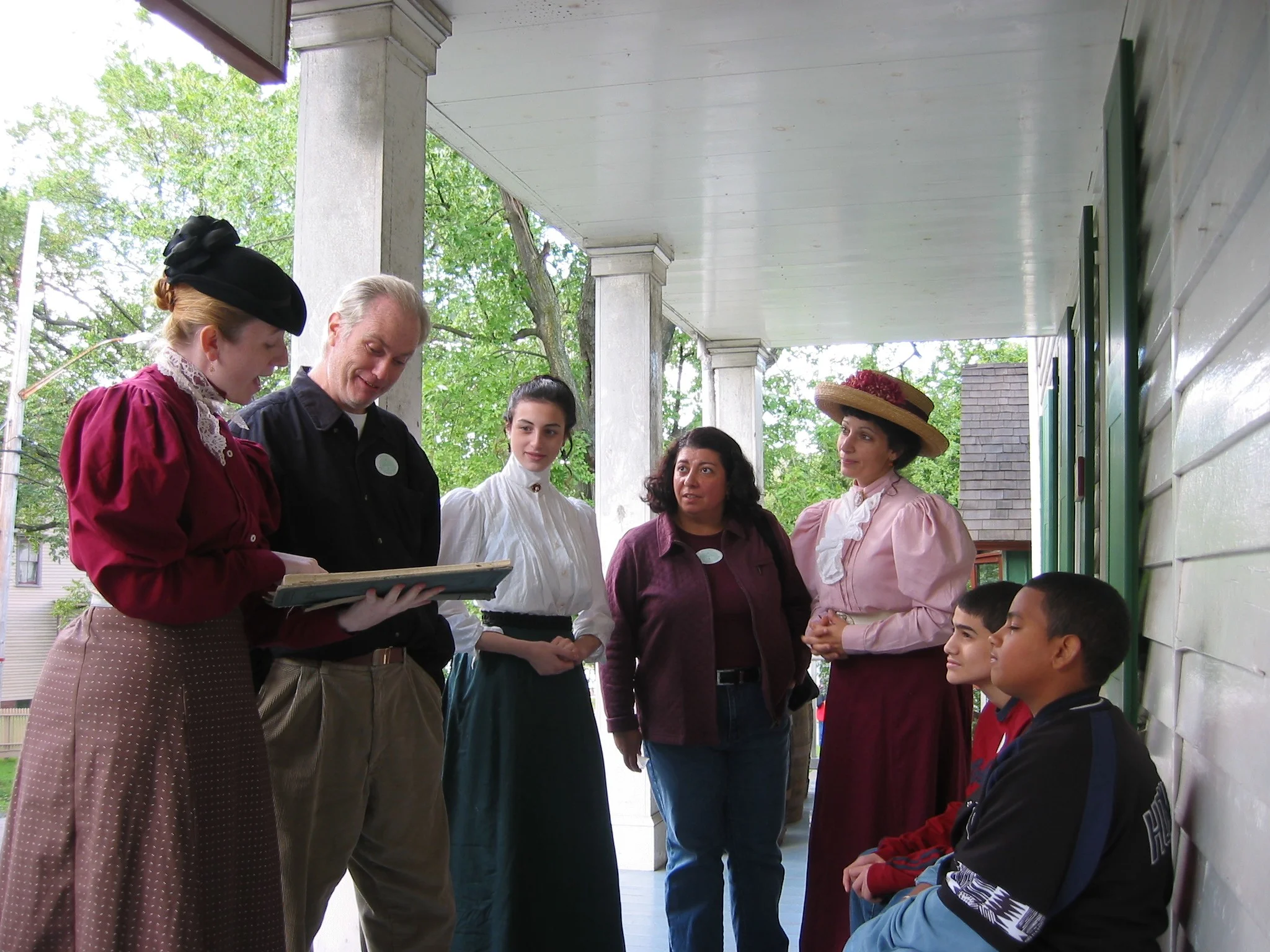 Black Sisters on Store Porch with Famly.jpg