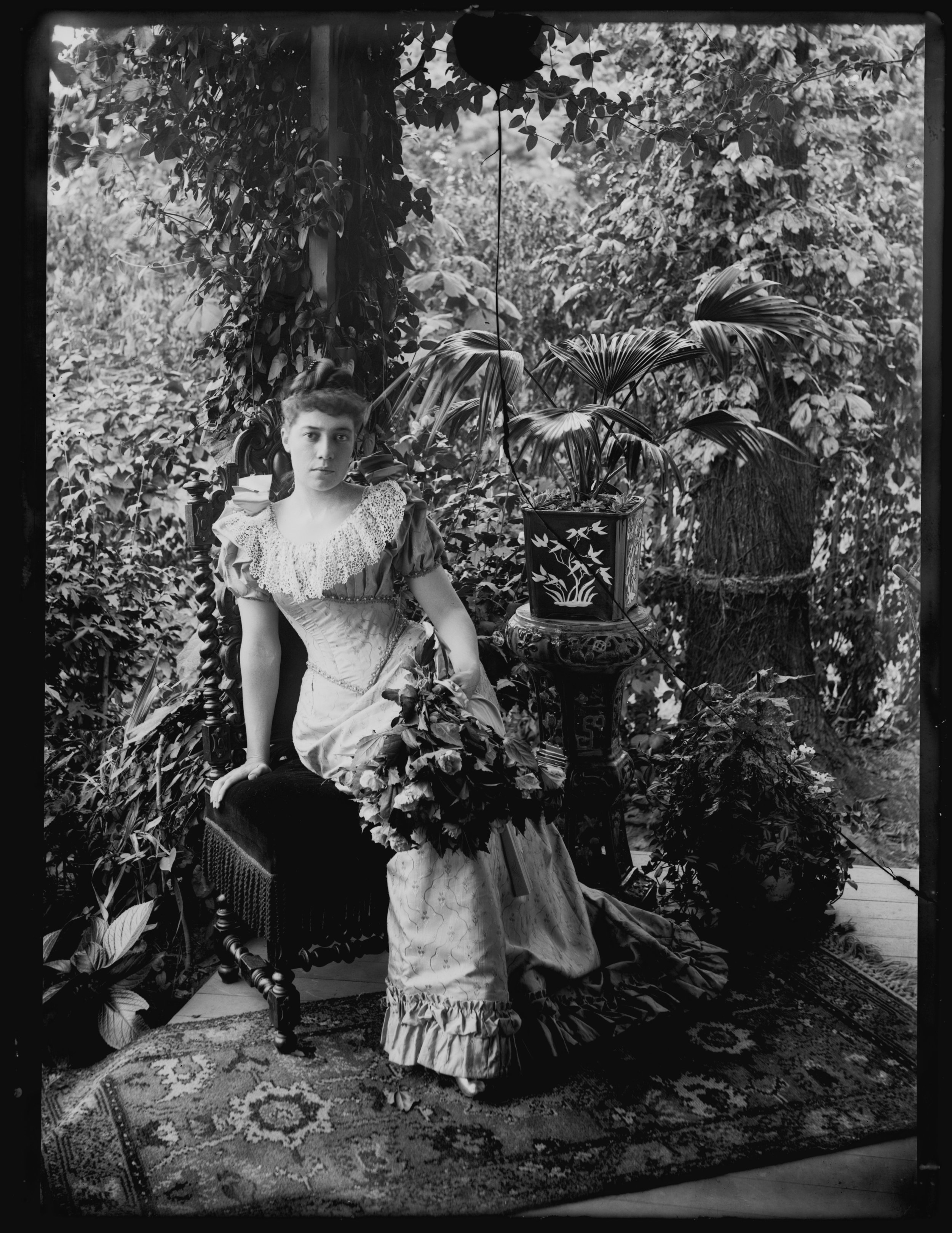 “Full length, with bouquet,” Alice Austen self-portrait at Clear Comfort, September 19, 1892