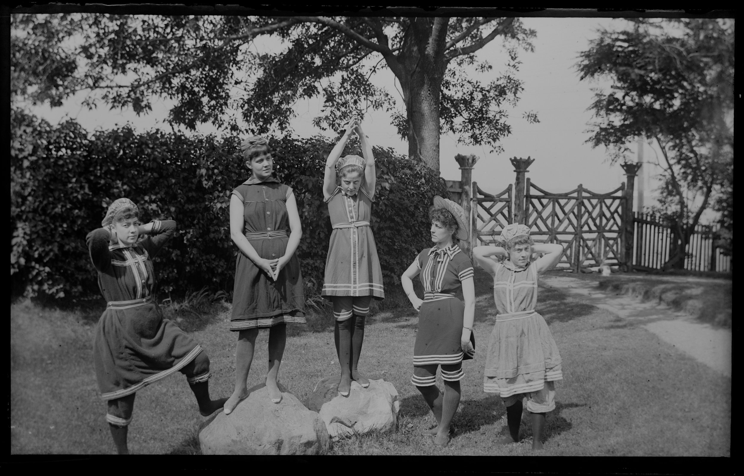 “Group in bathing costumes,” on the lawn at Clear Comfort, September 17, 1885. Alice Austen stands at far left