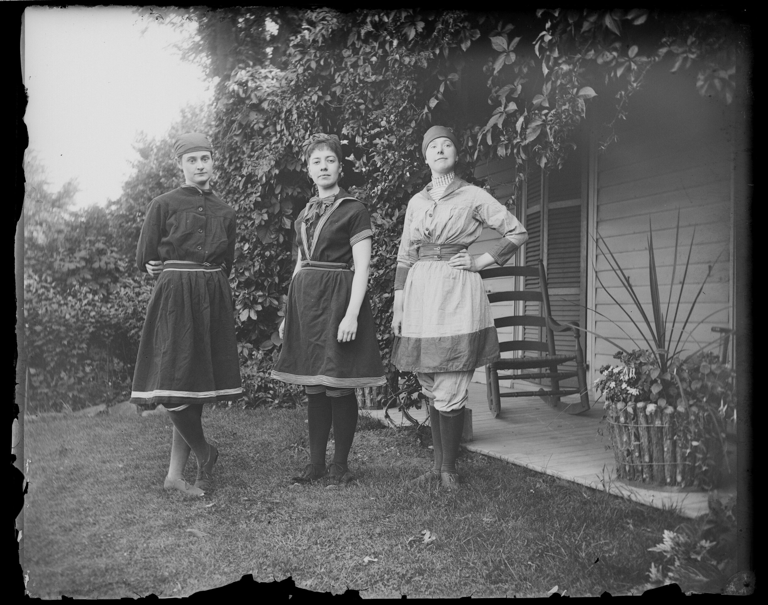  Alice Austen (center) with her friends Violet Ward (right) and Caroline Ward (left) at Clear Comfort, the Austen family home in Rosebank, Staten Island. Photo by Alice Austen, July 11, 1890. 