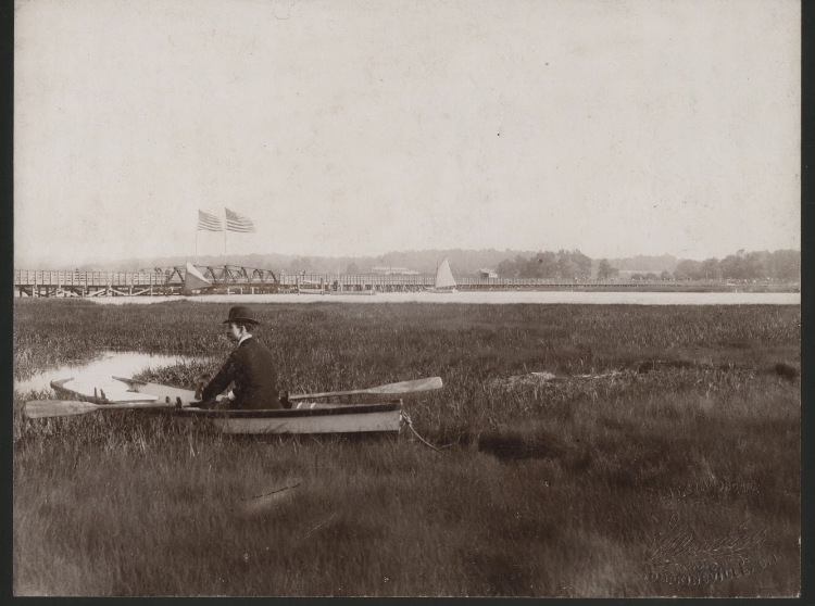 Richmond County Engineer Henry P. Morrison in a boat near the Fresh Kills bridge, June 6, 1896.