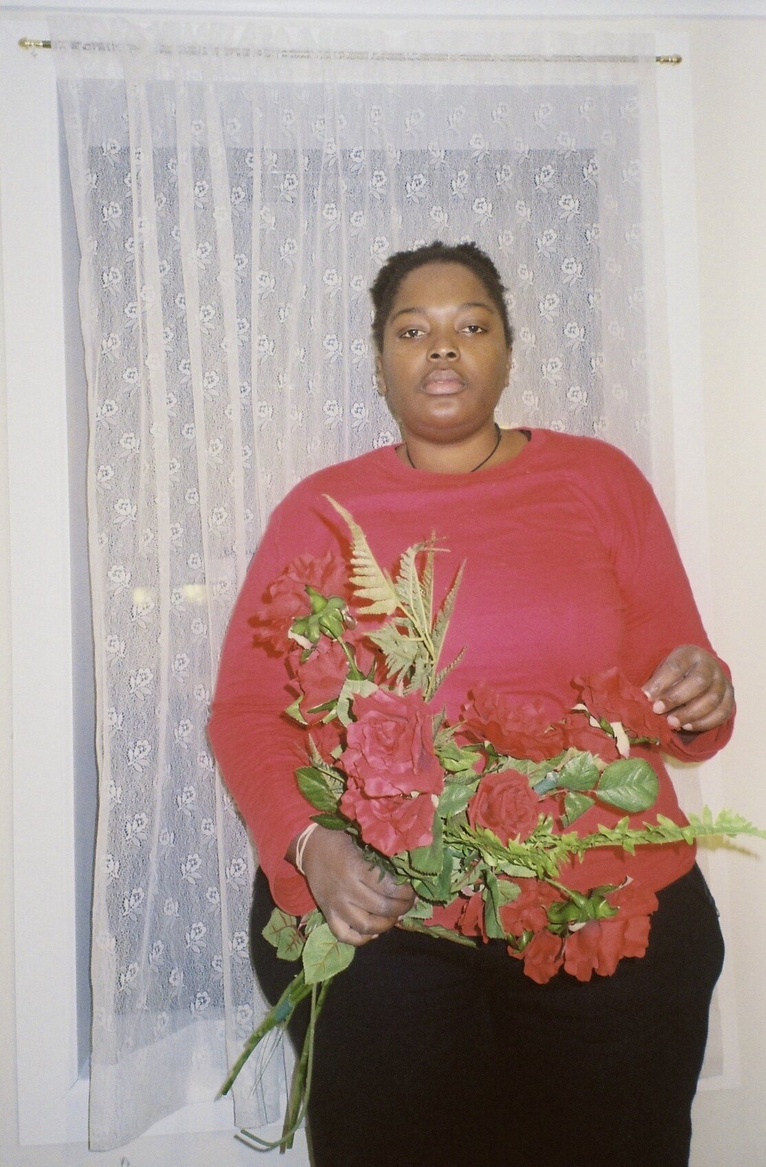 Midrene_with_roses_Brooklyn_December_2017.jpeg