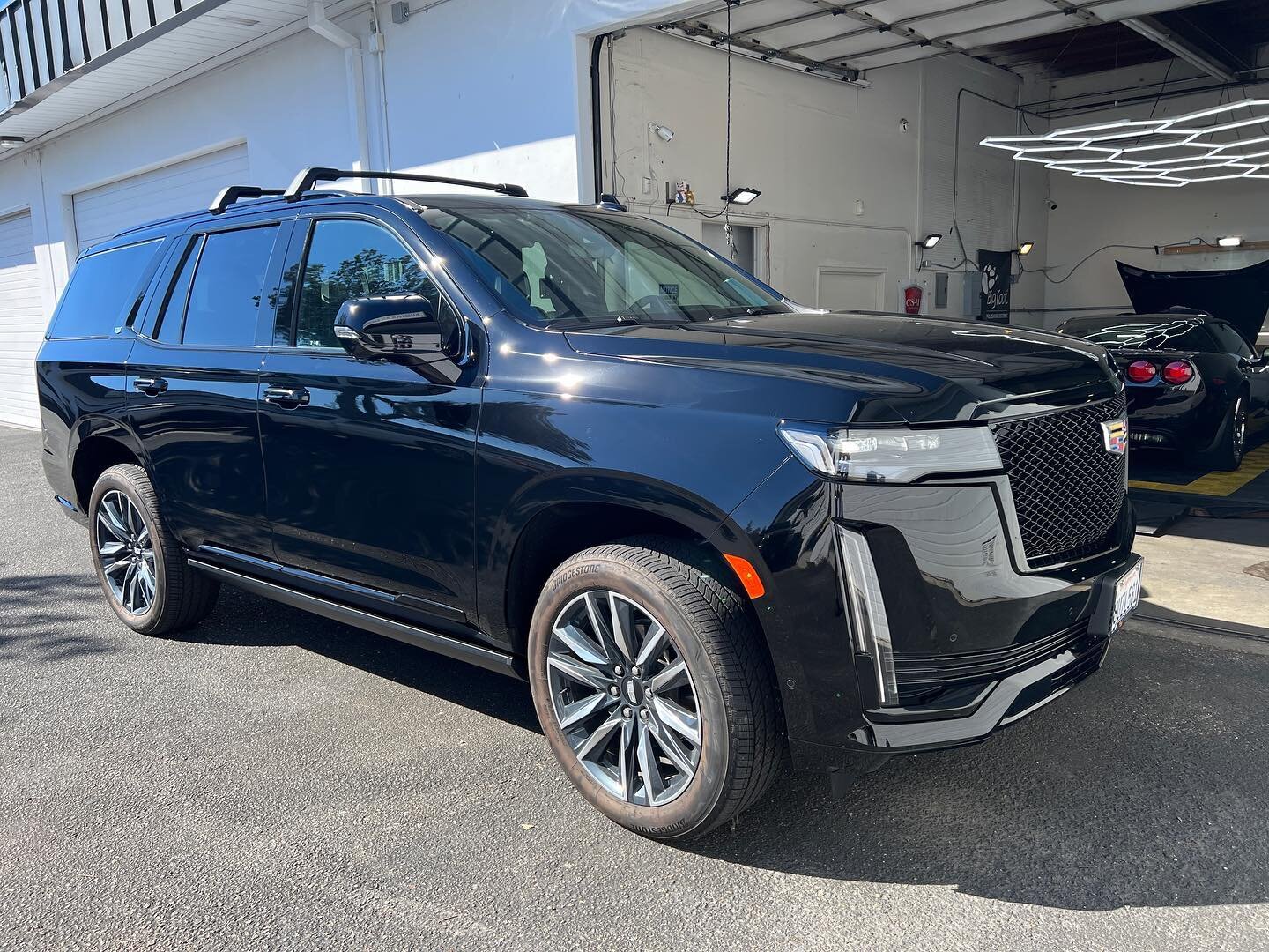 2022 Caddi Escalade in probably the best looking but worst color to have &mdash; solid ass black where if you look at it wrong it&rsquo;ll swirl, but oh so VIP. This was a budget install where the owner wanted to save on cost but wanted the most phys