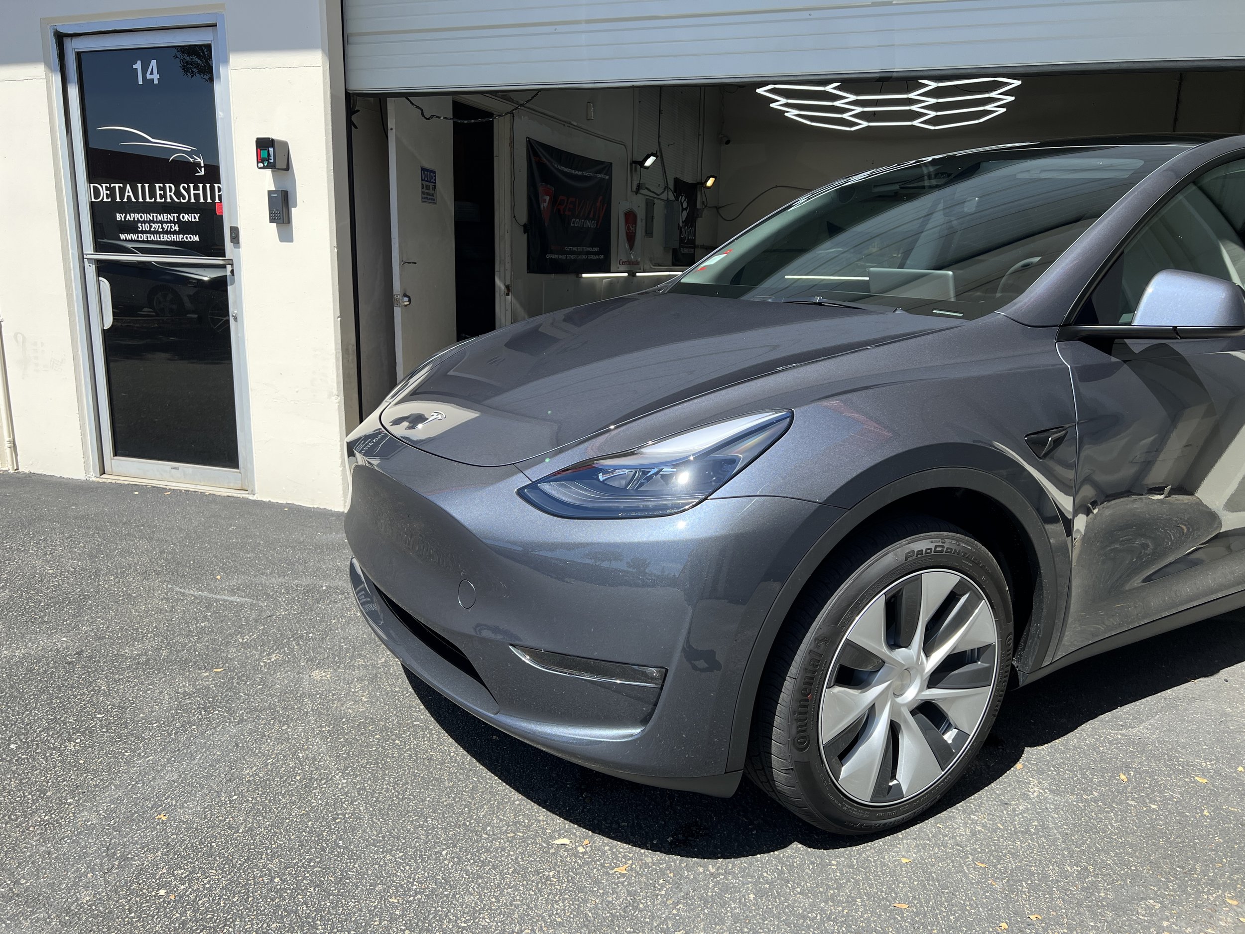 2023 Tesla Model Y (Grey Metallic) — Detailership™