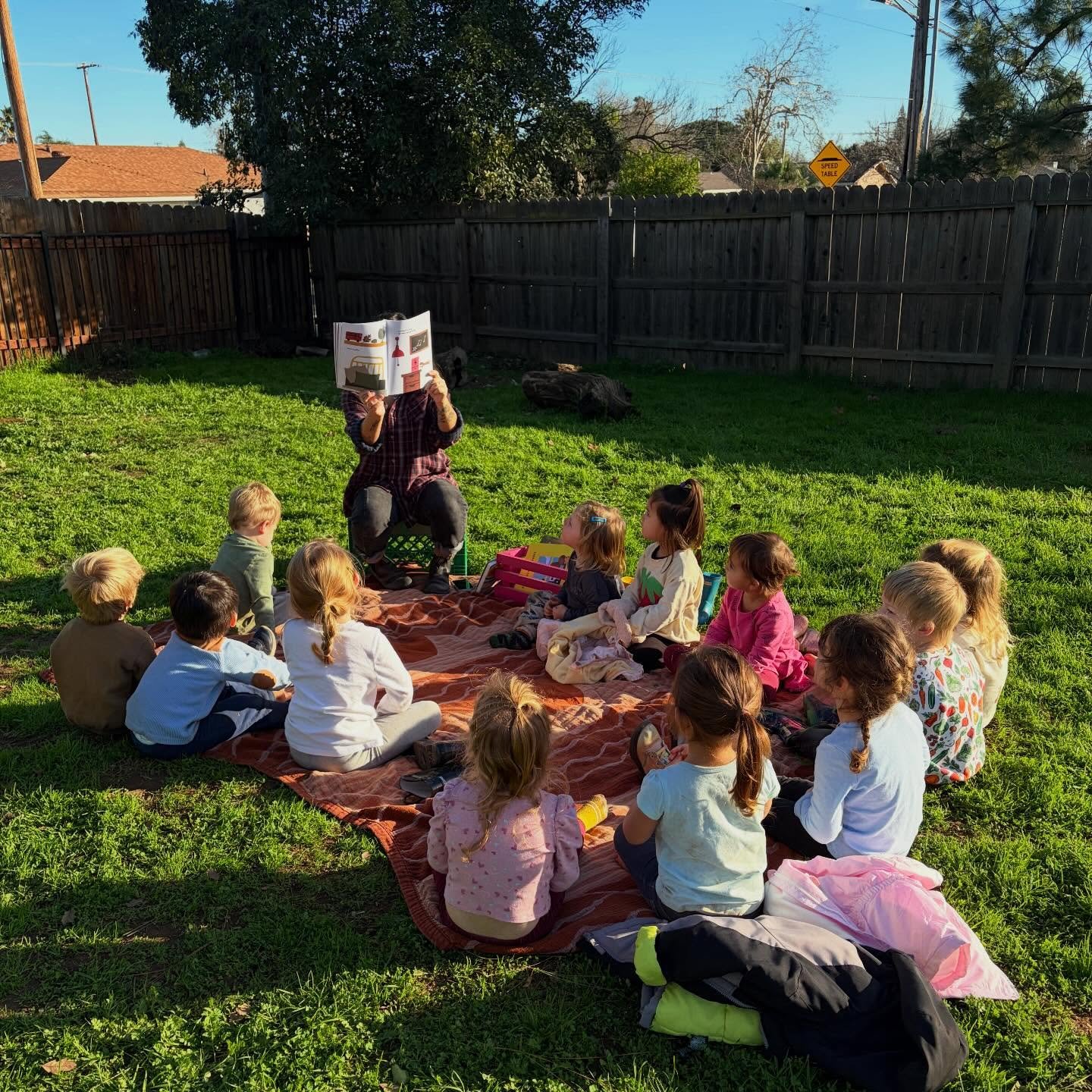 **Now enrolling children ages 2-5! Visit our website or call to book a tour! 

At Muck and Wonder, we take the time to share stories that honor ourselves, our peers, and our community. And we are so lucky we get to do it all in nature! 🍃

Reading to