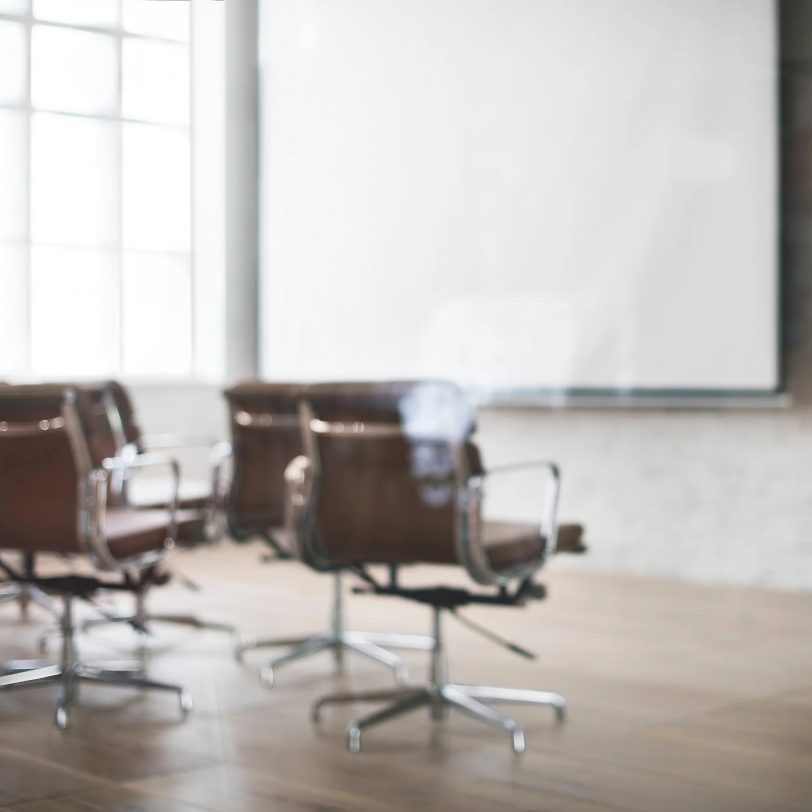 armchairs-blur-business-296883.jpg