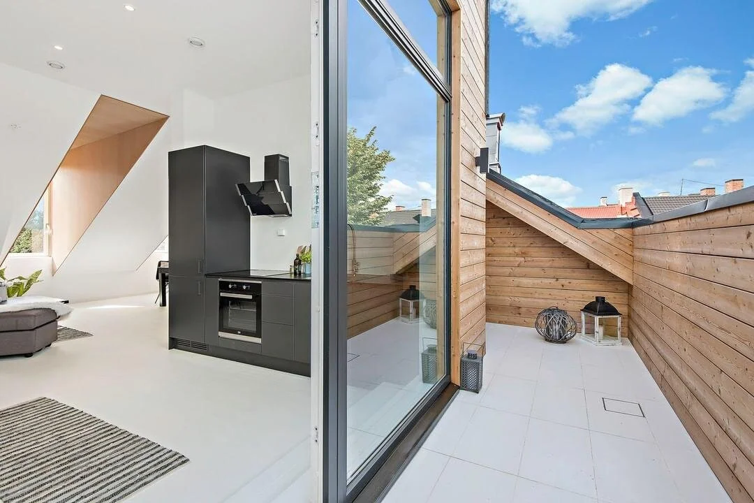 Black kitchens and a rooftop balcony to pop the Crémant on after a long day.