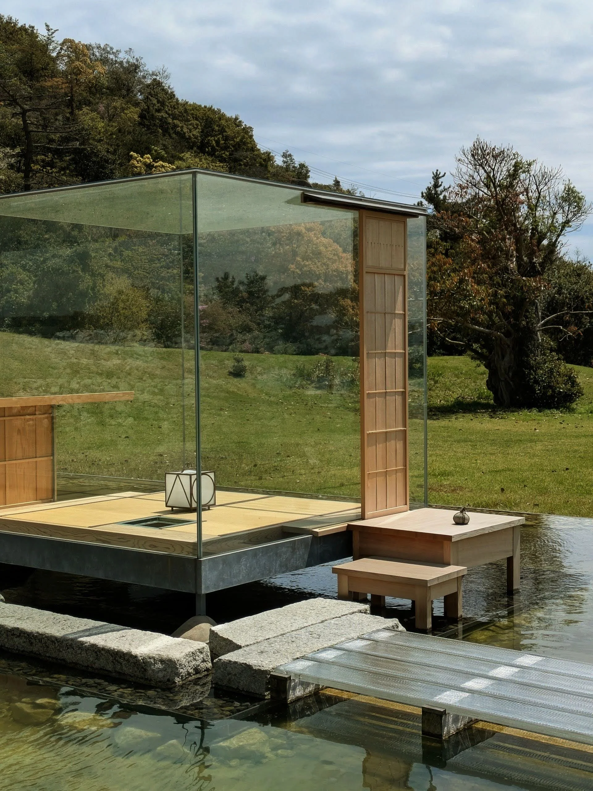 Naoshima Art House Project, timber facade and domestic garden An Art House Project property on Naoshima island: centuries-old weathered cedar timber facade, moss-edged stone path, and a minimalist domestic garden