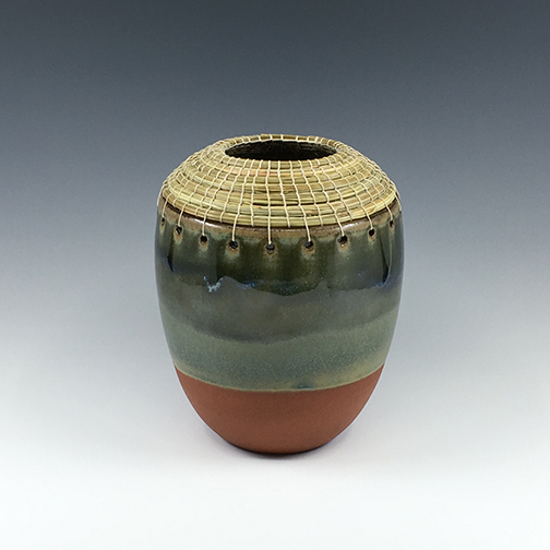 SMALL VASE WITH GREEN NEEDLES