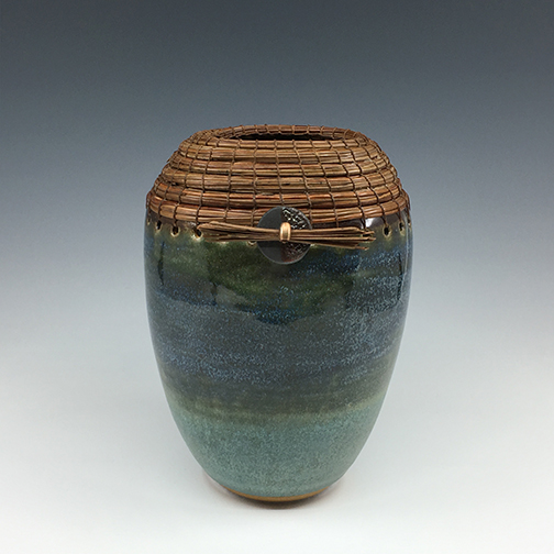 GREEN VASE WITH RAKU BUTTON