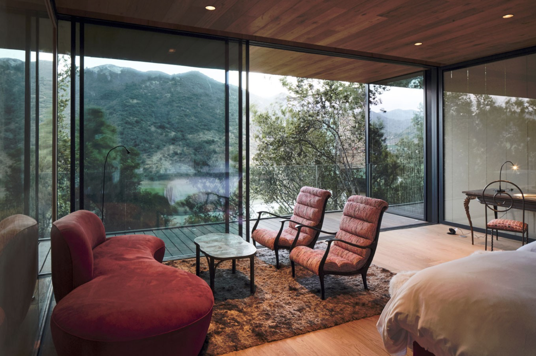 Shape of Women Suite at Puro Vik Retreat in Chile - Glass-walled houses on cliffs overlooking the Millahue Valley