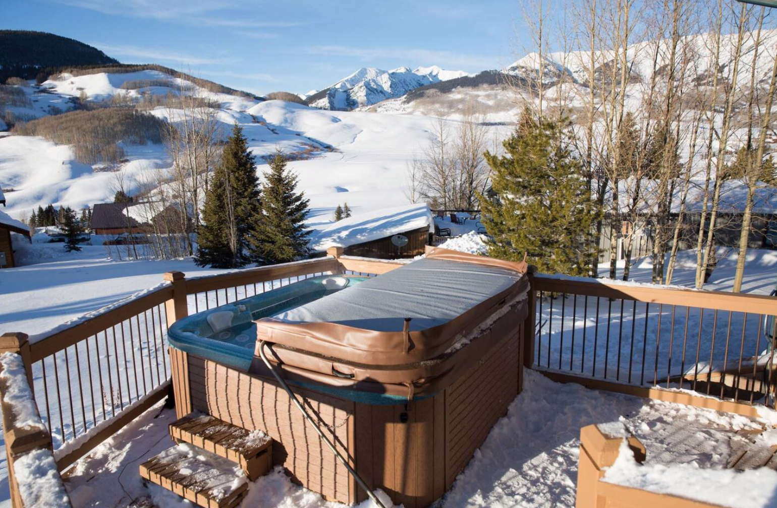 Hot Tub on the deck of Daisy Circle Views of Mountain Airbnb sleeps 12 in Crested Butte, Colorado