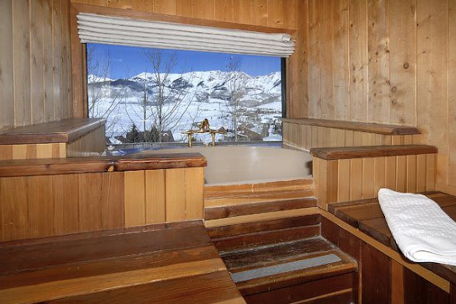 Indoor Jacuzzi tub with views at Daisy Circle Views of Mountain Airbnb sleeps 12 in Crested Butte, Colorado