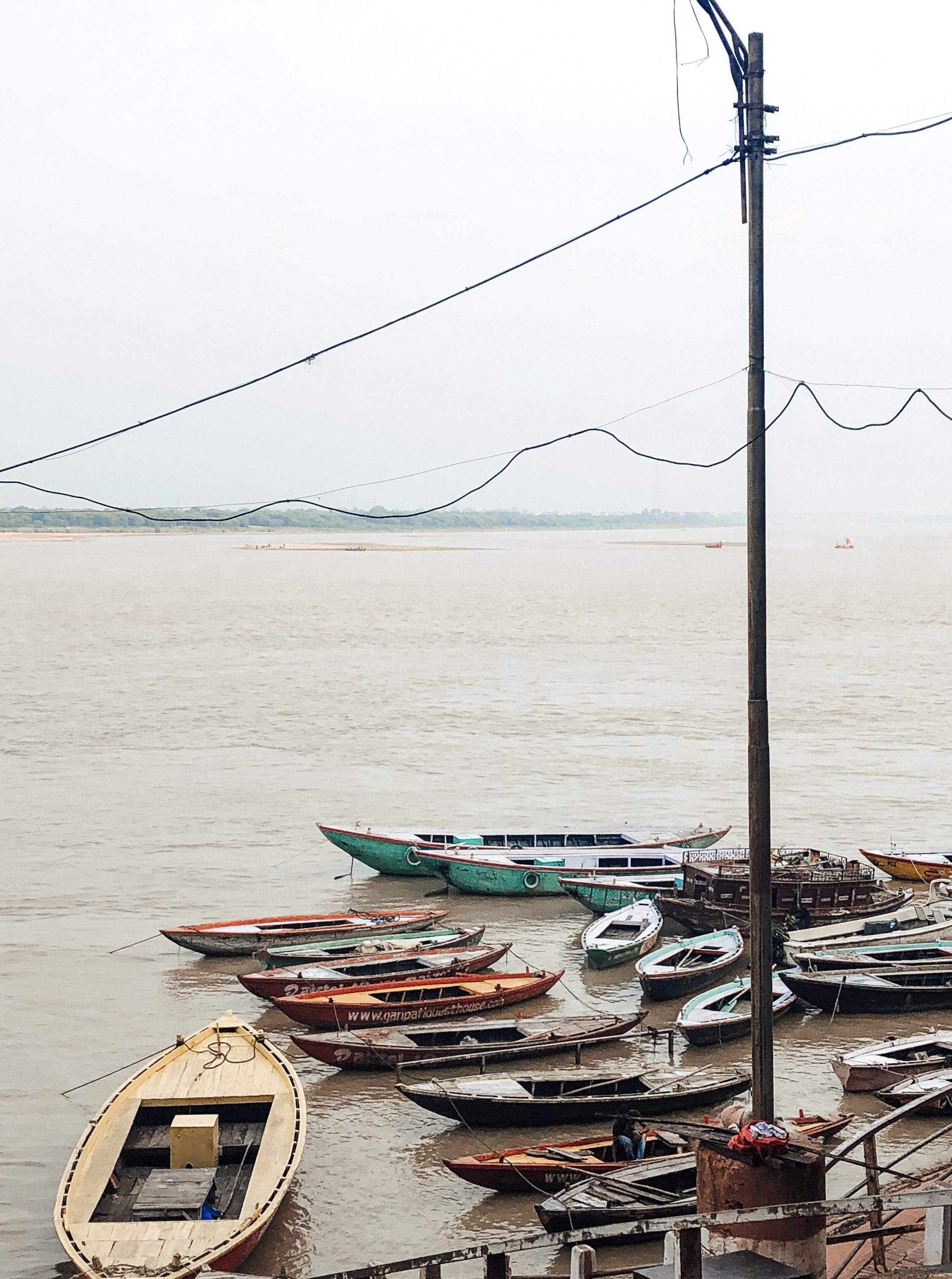 Boats on the Ganges River - photo by Ash Burns