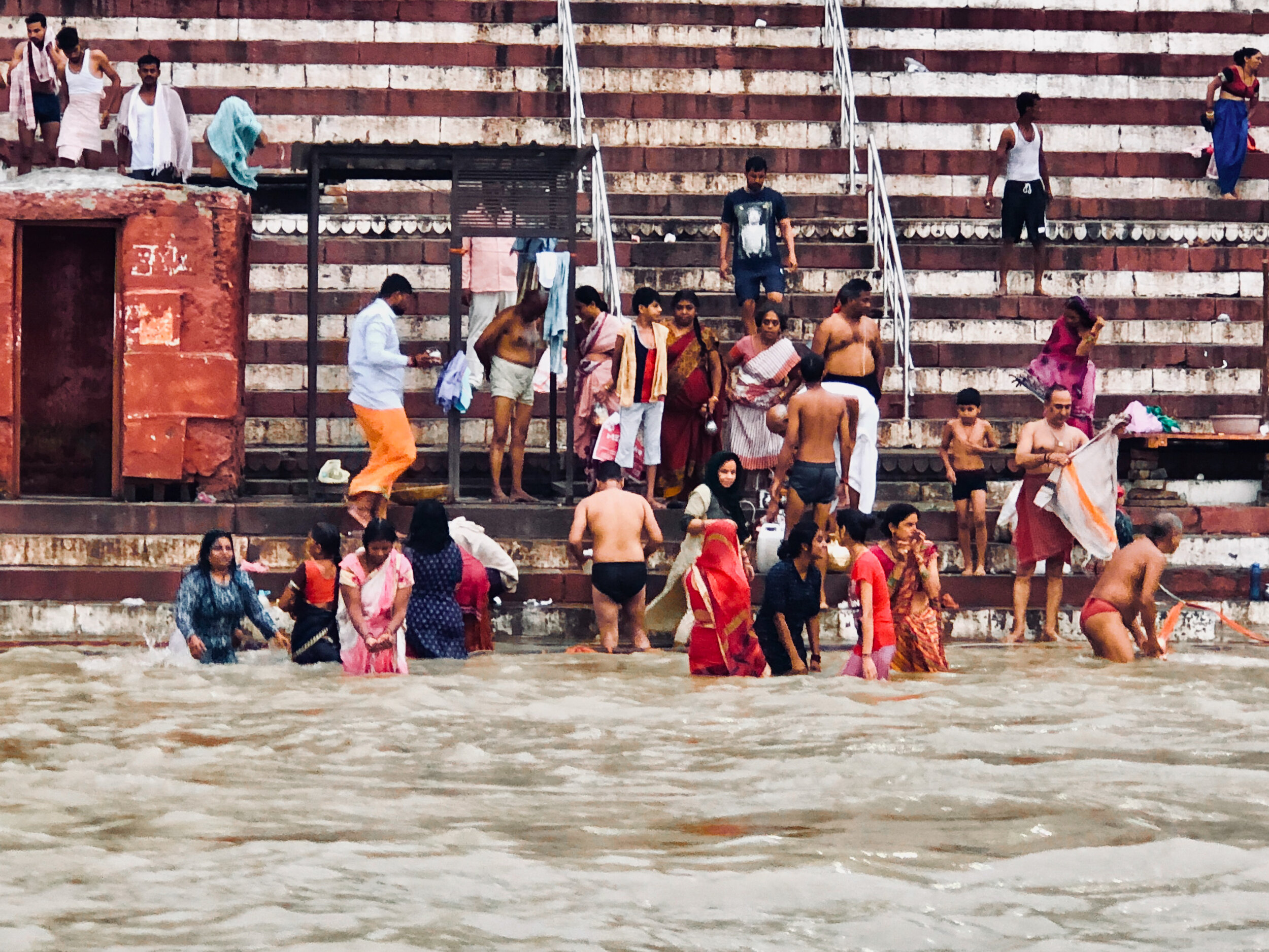 Hindu Indians bathing in the Ganges River - photo by Ash Burns