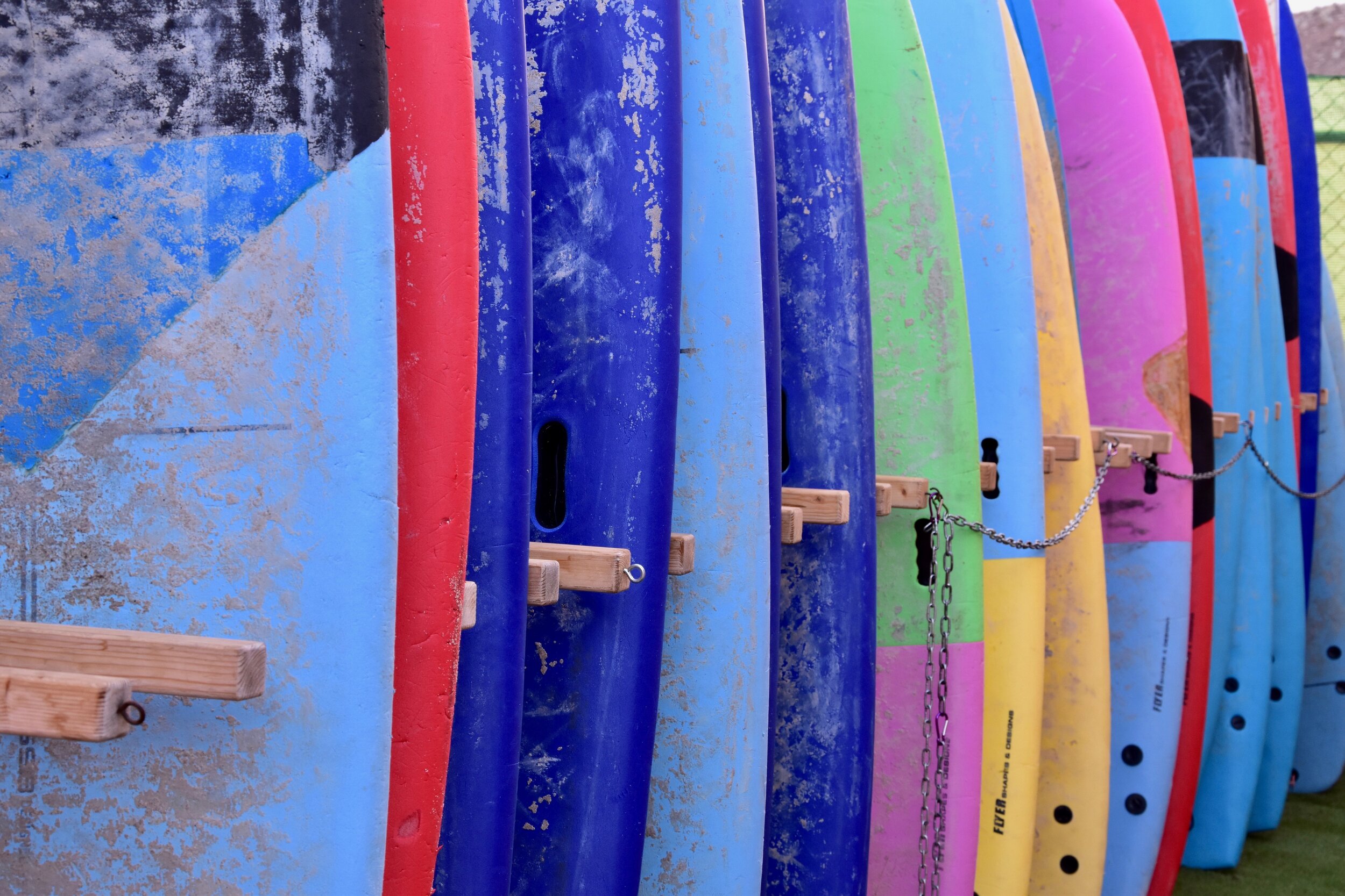 Alison gets a custom made surfboard while vacationing in Encinitas, California