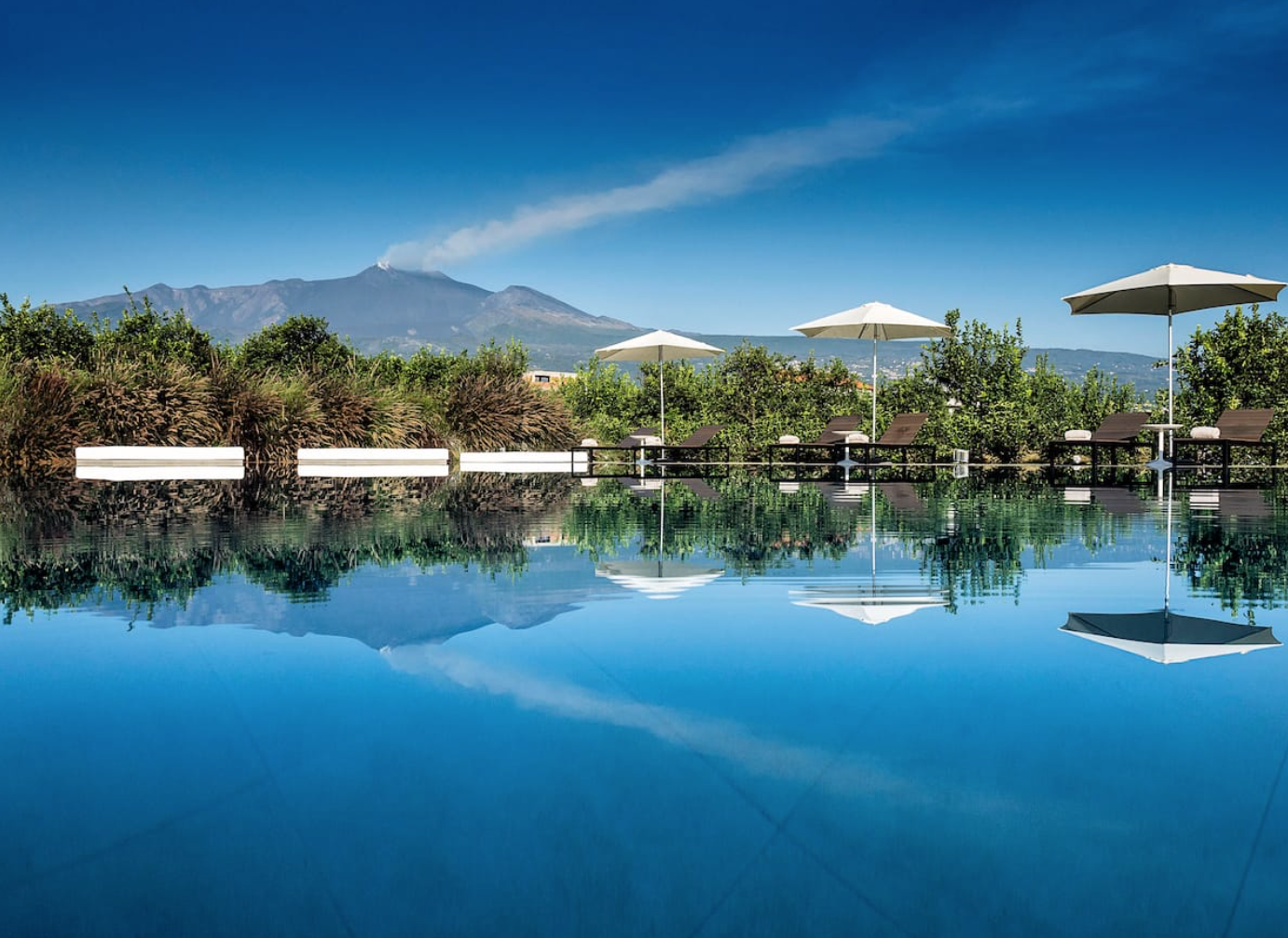 Views of Mt Etna from the Pool of Ramo d'aria country hotel villa on Airbnb - rent an entire 12 bedroom villa hotel in Giarre, Sicily, Italy