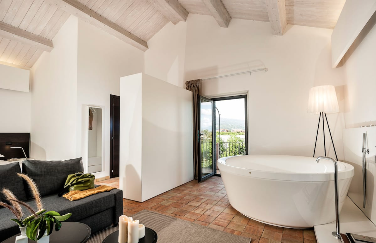 Junior Suite with Round Stone Bathtub in-room at Ramo d'aria country hotel villa on Airbnb - rent an entire 12 bedroom villa hotel in Giarre, Sicily, Italy