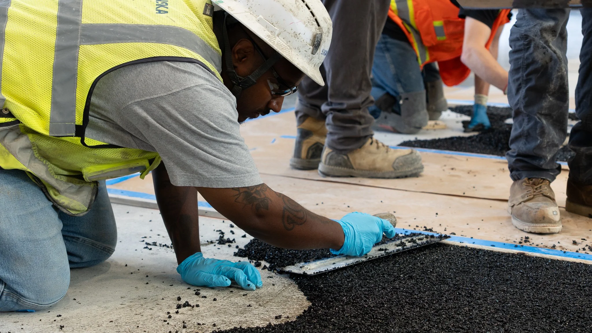 Our Cement Mason apprentices recently performed some seamless rubber-surface installation with Synergy Building Tech's, Groundvex; a polymer safety surface engineered for extreme impact attenuation and UV stability across play, sport, and aquatic inf