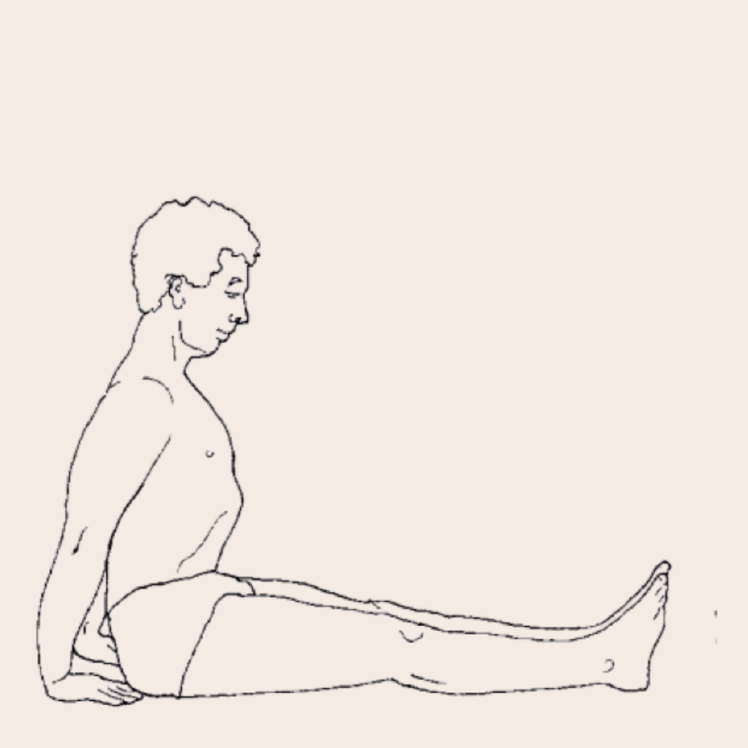 A yoga student in dandasana