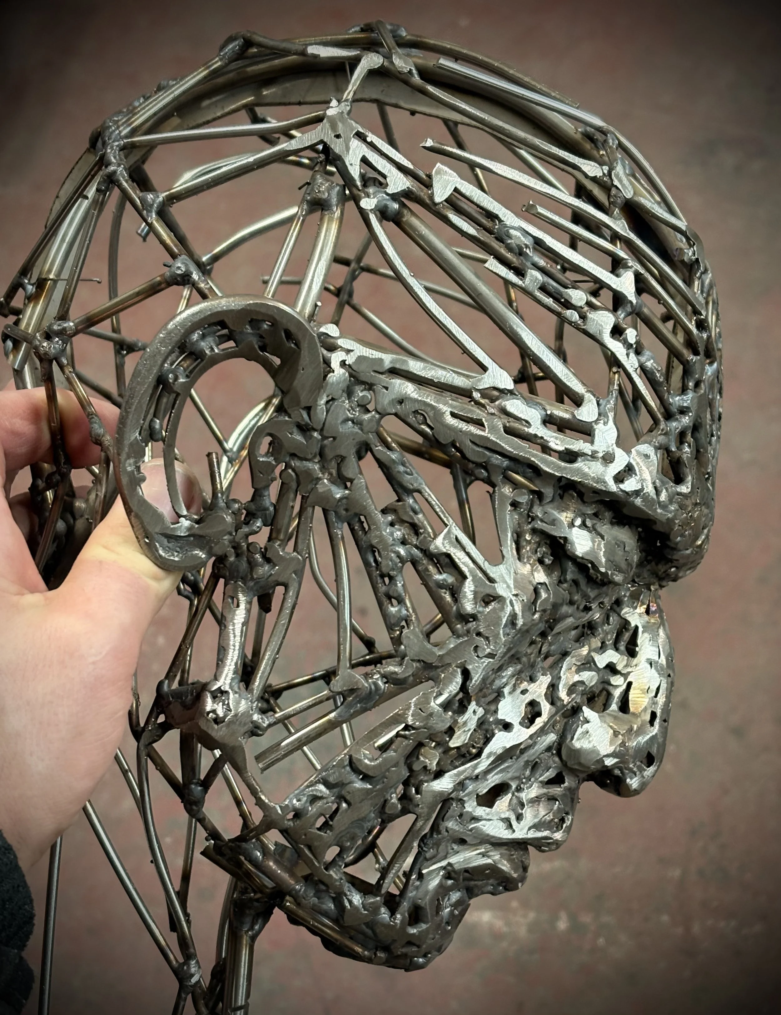 Metal figurative sculpture in progress by British Sculptor James Sutton