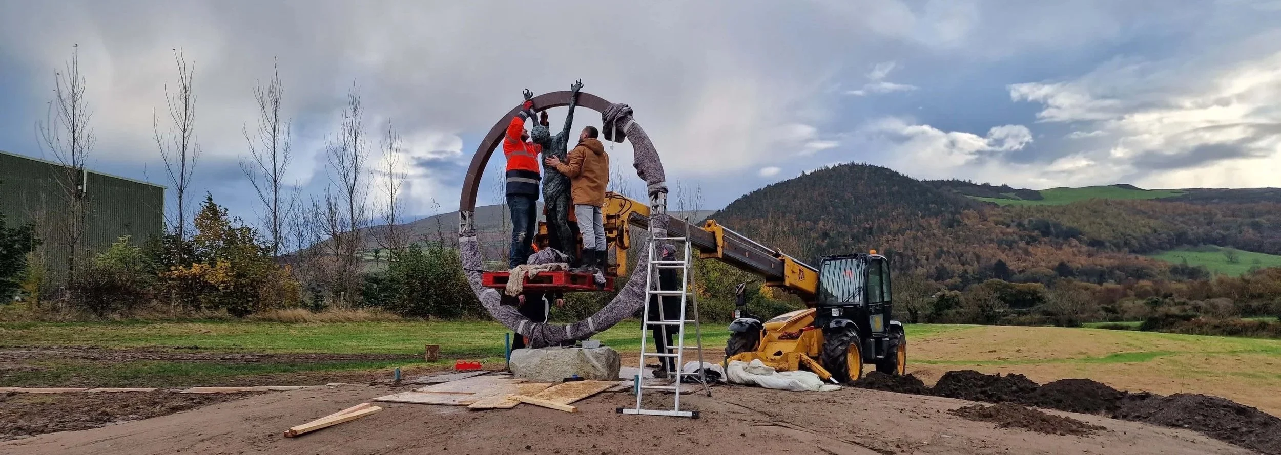 Instillation of a monumental bronze sculpture